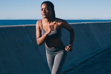 Runner checking a smartwatch before a run