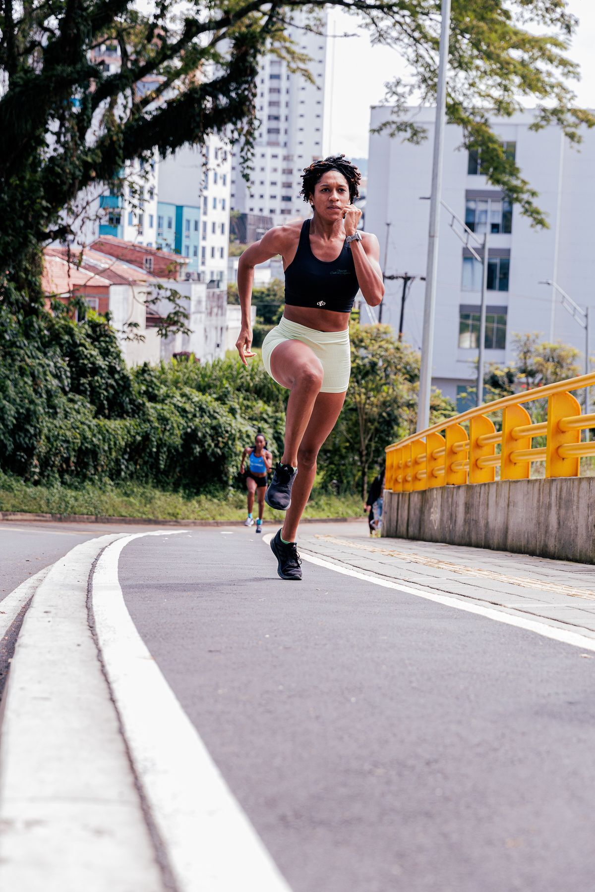 Female runner on urban road