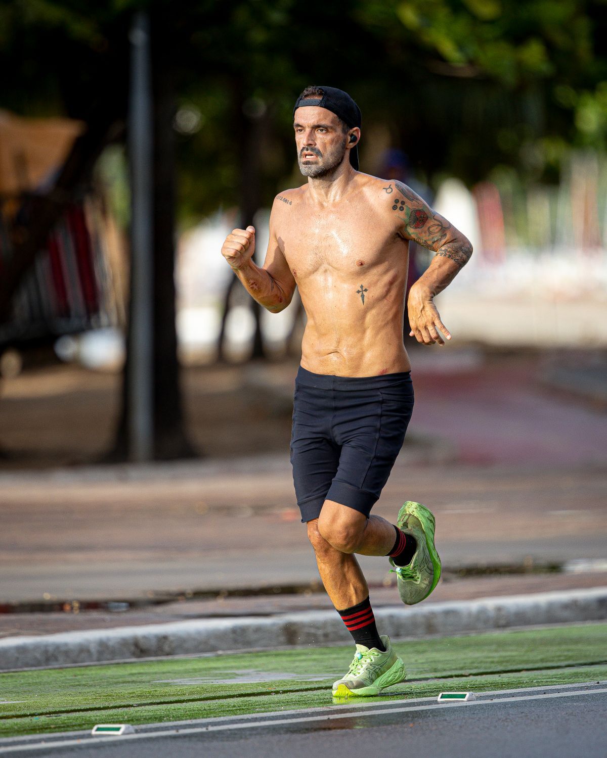 Runner on open highway at dawn